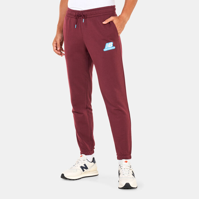 New Balance Men's NB Essentials Stacked Rubber Pack Sweatpants Red New Balance Men's NB Essentials Stacked Rubber Pack Sweatpants Red image number 0